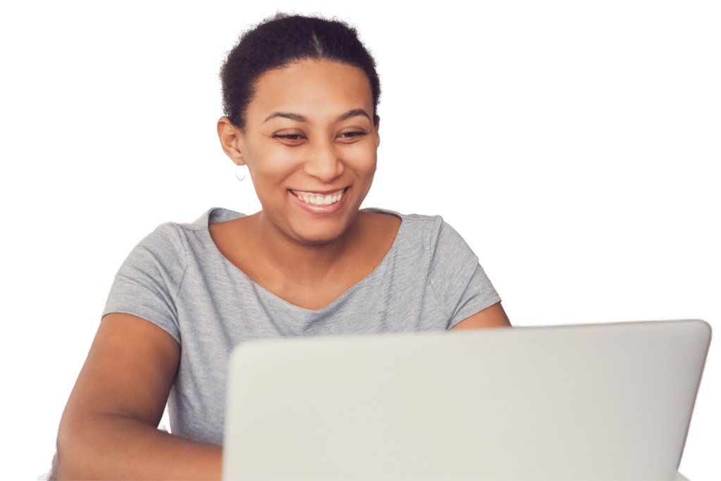 Woman looking at laptop, smiling